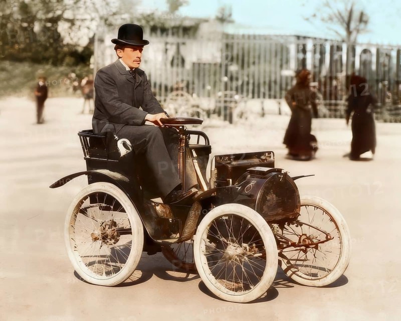 Portrait of Louis Renault, 1877 – 1944, French industrialist, a pioneer of the automobile industry, with his first automobile Renault Voiturette, Type A, 1898, digitally edited based on a historical photograph, subsequently colored