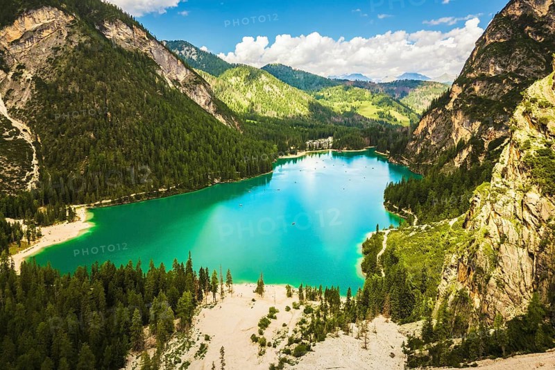 Aerial panorama view Lago di Braies lake in Dolomites mountains. Dolomiti. Italian alps.Turquoise lake in northern Italy. Popular summer visit destination Europe. Glacier alpine lake - Pragser Wildsee