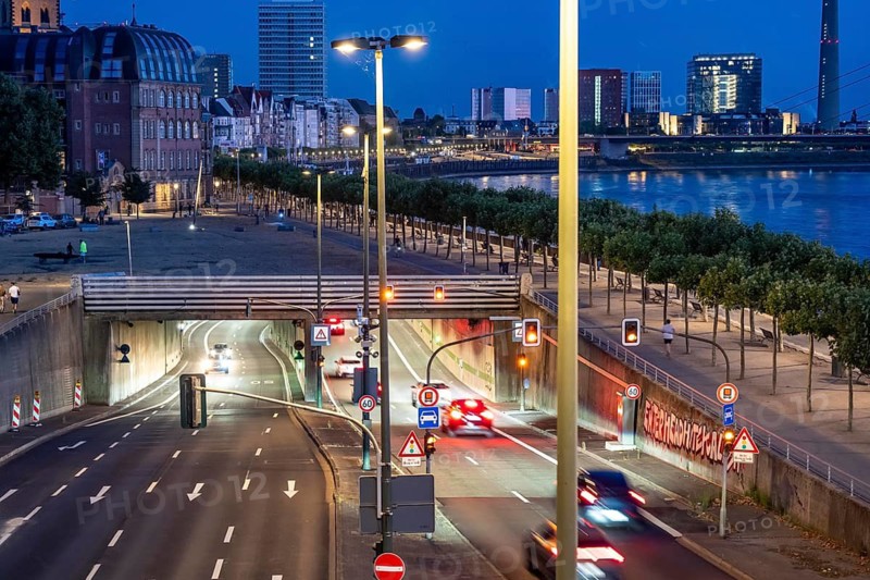 The Rhine Bank Tunnel in Düsseldorf, 1928 meters long, four-lane road tunnel Bundesstraße B1, along the Rhine, below the banks of the Old Town, here the northern entrance at the Oberkassler Bridge, looking south, old town, Rhine Tower, North Rhine-Westphalia, Germany