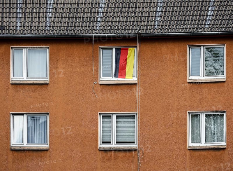 A German flag on an open window of a house, 27.07.2026, Gelsenkirchen, Nordrehein Westphalia, Germany