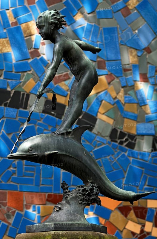 Girl sitting on a dolphin, sculpture in Nuremberg Zoo, Nuremberg, Middle Franconia, Bavaria, Germany