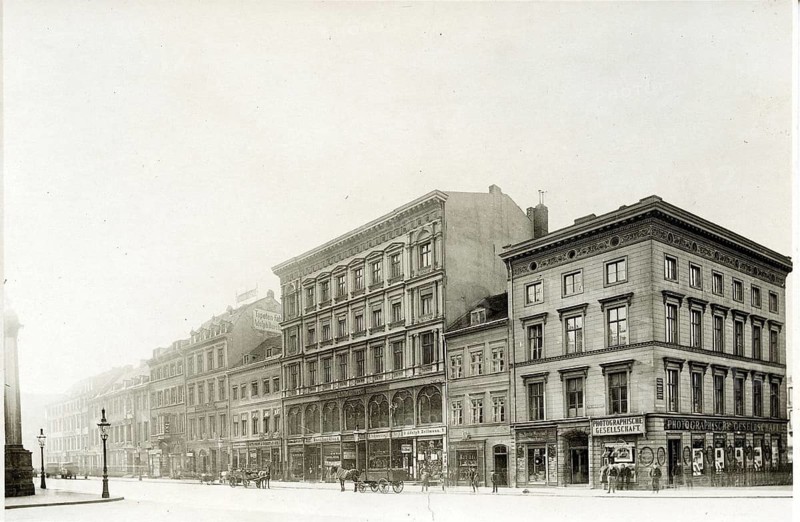 Historic buildings in a street with a clear urban structure. black and white photography