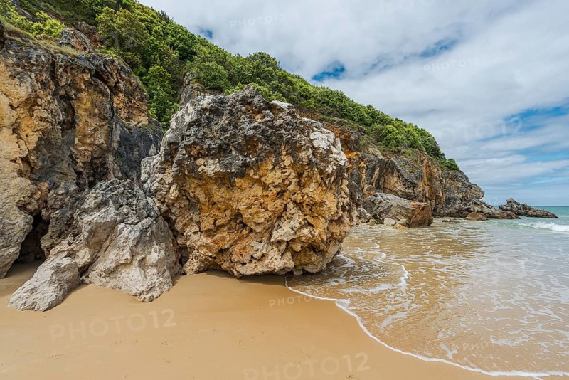 Rocks at Playa de Berria in Santona, surfing beach in Cantabria, Spain