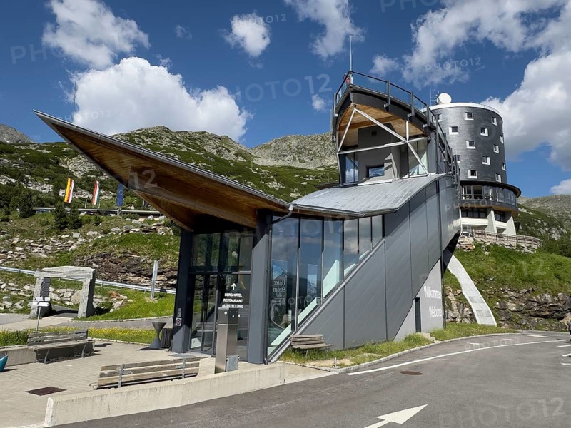 Lower access to Berghotel Malta next to Kölnbreinstaumauer Kölnbreinsperre Kölnbrein Dam dam, in the background cylindrical building of Berghotel Malta, Carinthia, Austria
