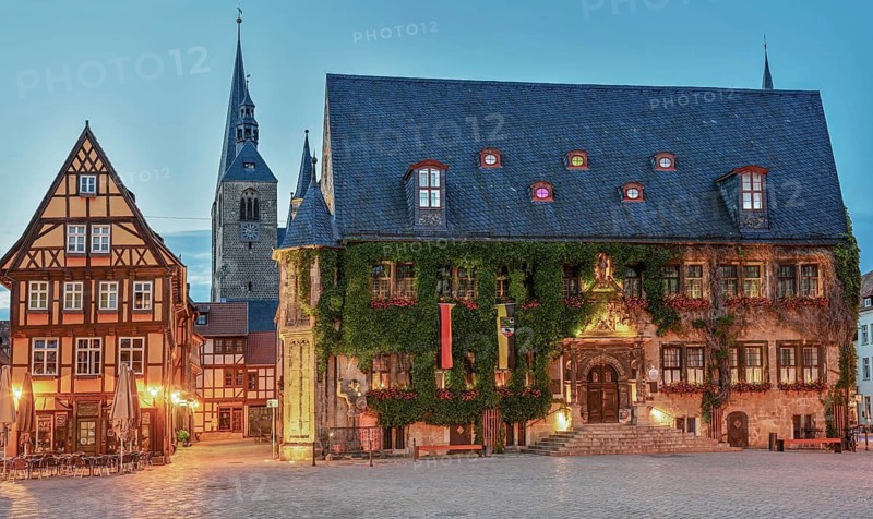 Town hall on the market square illuminates Quedlinburg Harz Germany