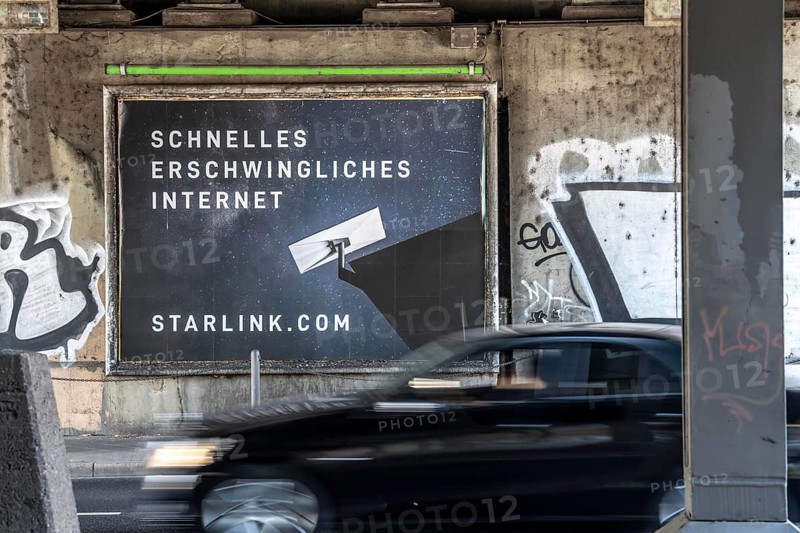 Advertising for fast Internet via Starlink, Internet access via a satellite network, from the US space company SpaceX, with high data speed, in Düsseldorf, North Rhine-Westphalia, Germany