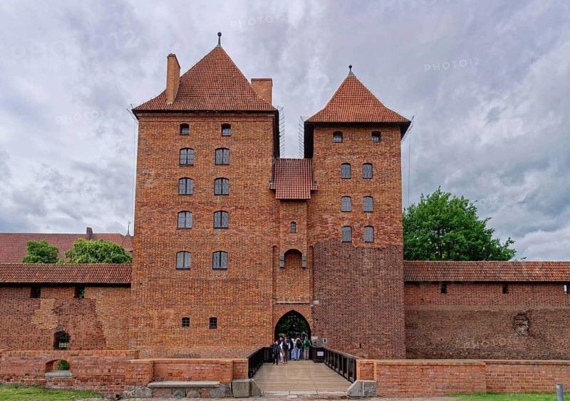 External fortifications of Malbork. The Malborku Castle, Zamek w Malborku, is a neo-Gothic lowland castle built by the Teutonic Order, and is a UNESCO World Heritage Site. Malbork, Pomerania, Poland