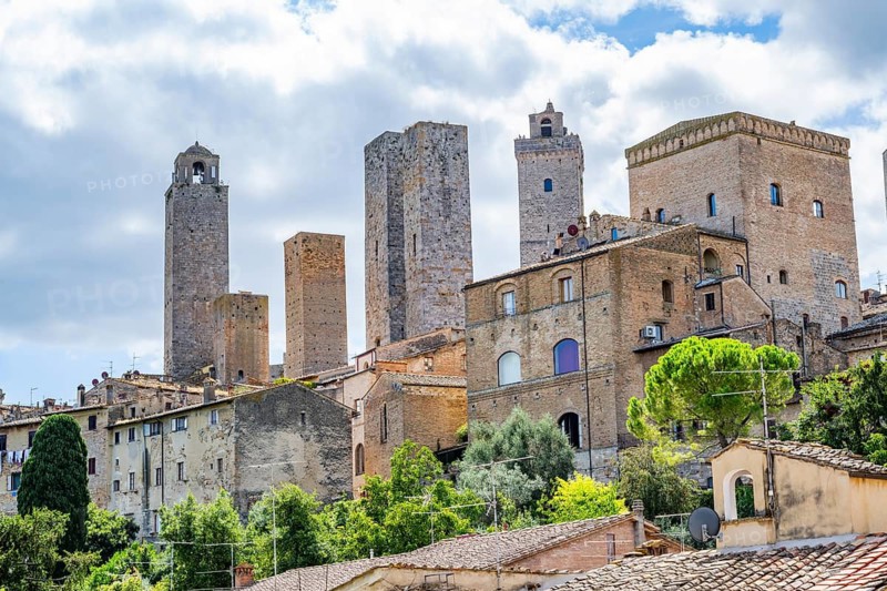 Towers of the old Town with historic buildings at San Gimignano on a sunny day, Tuscany, UNESCO World Heritage, Italy, Europe, Europe
