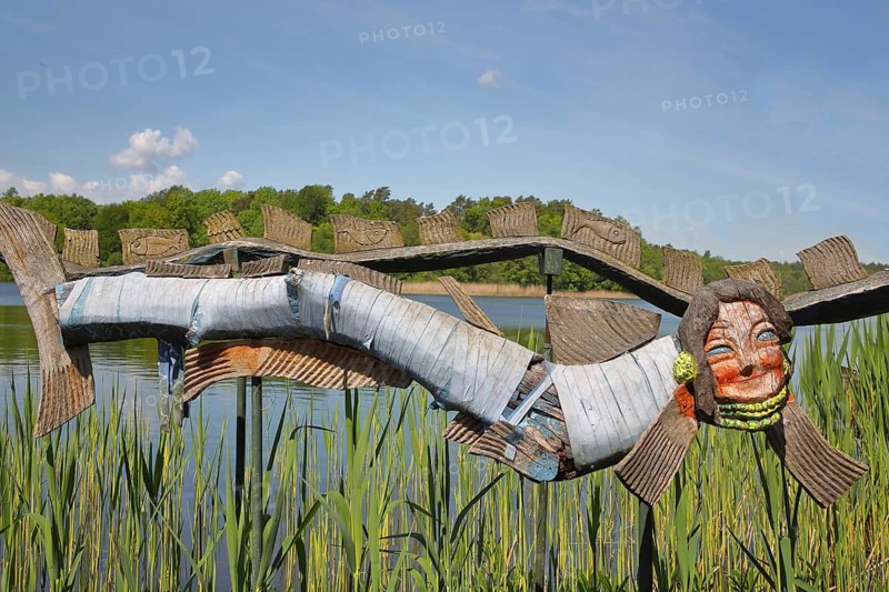 Sculpture by Tony Torrilhon 2008, floating laughing, cheerful mermaid, face, hair, mermaid, modern art, wood carving, Bohlenweg, harbour, Rheinsberg, Ruppiner Switzerland, Ruppiner Land, Brandenburg, Germany