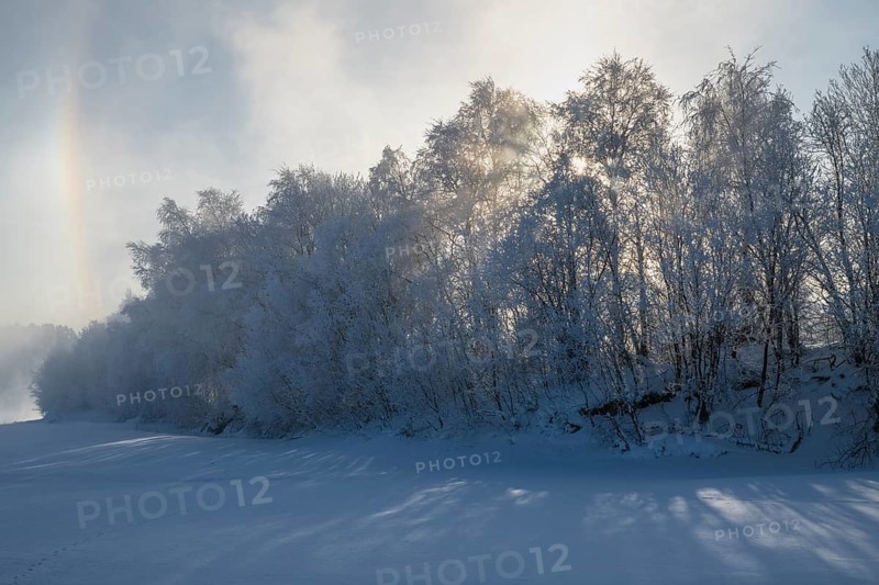 Fog and parhelion over the frozen river Glomma (Glåma), Alvdal, Hedmark, Innlandet, Norway, February 2026
