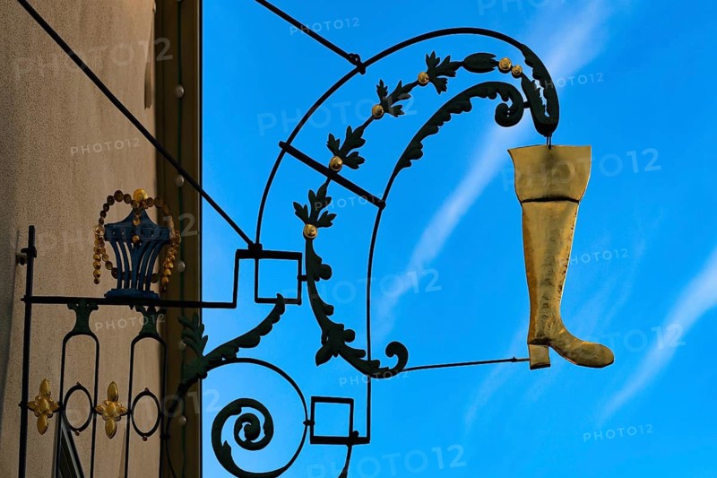 Golden boot, shoemaker's nose shield, shoemaker, Bad Cannstatt, Baden-Württemberg, Germany