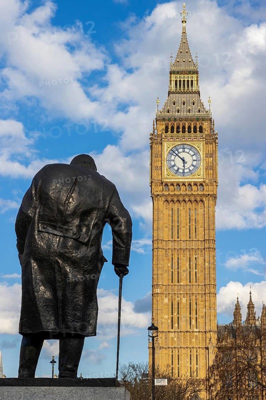 Sculptor Ivor Robert-Jones's statue of Winston Churchill, in front of Elizabeth Tower, Houses of Parliament, London, United Kingdom