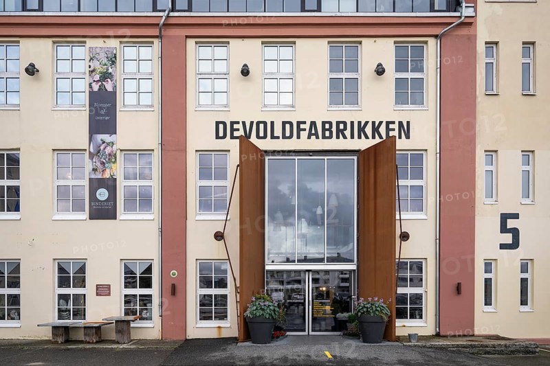 Entrance to the historic Devold factory, Devoldfabrikken, outlet center in Langevåg, near Ålesund or Alesund, Møre og Romsdal Fylke, Norway