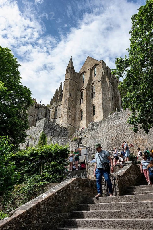 View over the stairway to Le Mont-Saint-Michel Abbey on Rocky Island, monastery island, tourist attraction, UNESCO World Heritage Site, Pontorson, Manche department, Normandy, France
