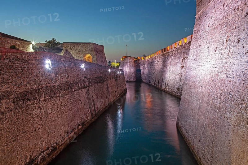 Lights illuminate the Royal moat in the Royal Walls ensemble, Ceuta, Spain, North Africa