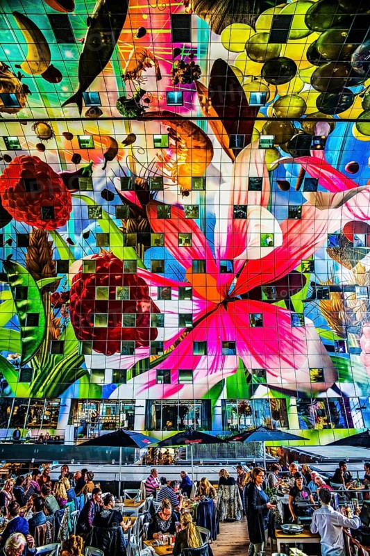 Markthal from 2014, offers over 100 food stalls and delicatessens with spectacular ceiling fresco cornucopia, Horn of Plenty by Arno Coenen and Iris Roskam, Rotterdam, the Netherlands