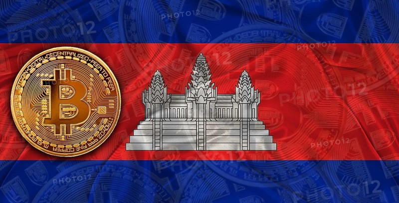Investors in Blockchain Technology with Cambodia flag background. Bitcoin cryptocurrency with Cambodian flag