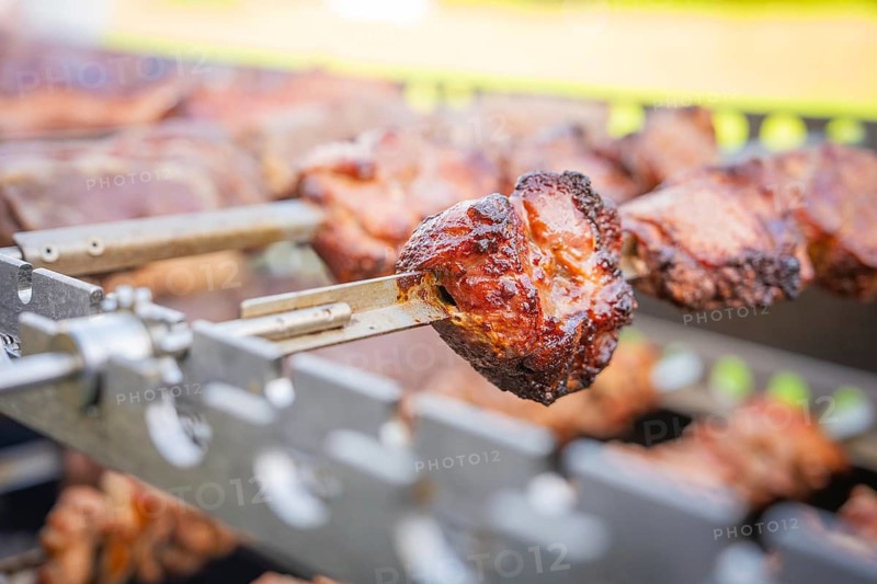 Close-up of a juicy piece of meat on a skewer on a grill, wedding, Grossglattbach, Germany