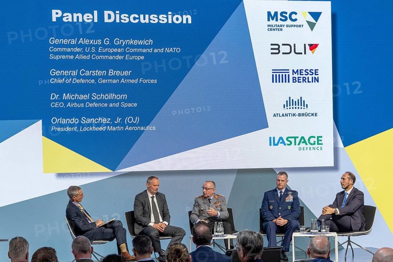 Robert Wall, Executive Editor of Defence & Space at Aviation Week, General Carsten Breuer, Inspector General of the Bundeswehr, Alexus G. Grynkewich, U.S. European Command and NATO Supreme Allied Commander Europe (SACEUR), Orlando Sanchez Jr, President at Lockheed Martin Aeronautics, Dr Michael Schoellhorn, President of the German Aerospace Industries Association (BDLI) at the SACEUR discussion organised by Atlantik-Brücke – International Aerospace Exhibition (ILA), Berlin ExpoCenter Airport, Schönefeld, 11 June 2026