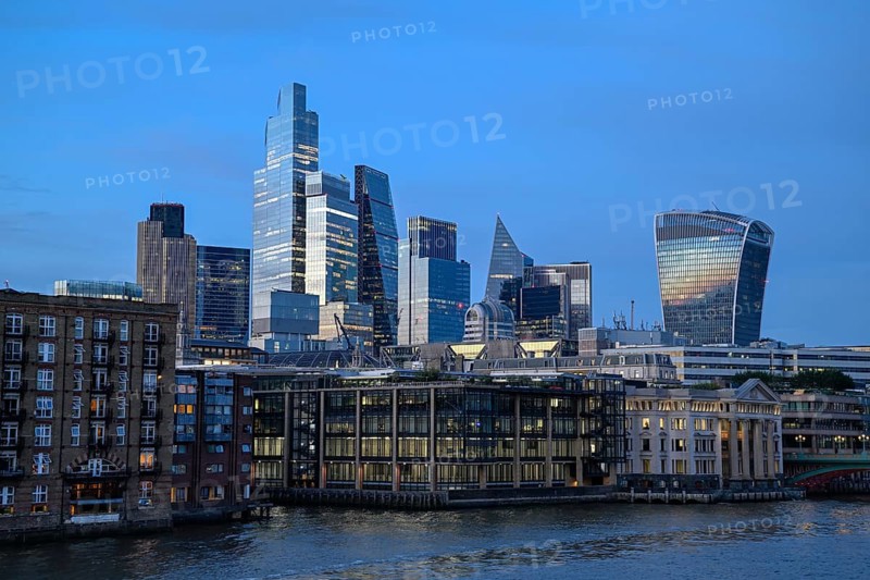 City of London skyline with skyscrapers 22 Bishopsgate, Leadenhall Building, Cheesegrater, and 20 Fenchurch Street, walkie talkie, on the Thames, blue hour, London, England, Great Britain, Great Britain