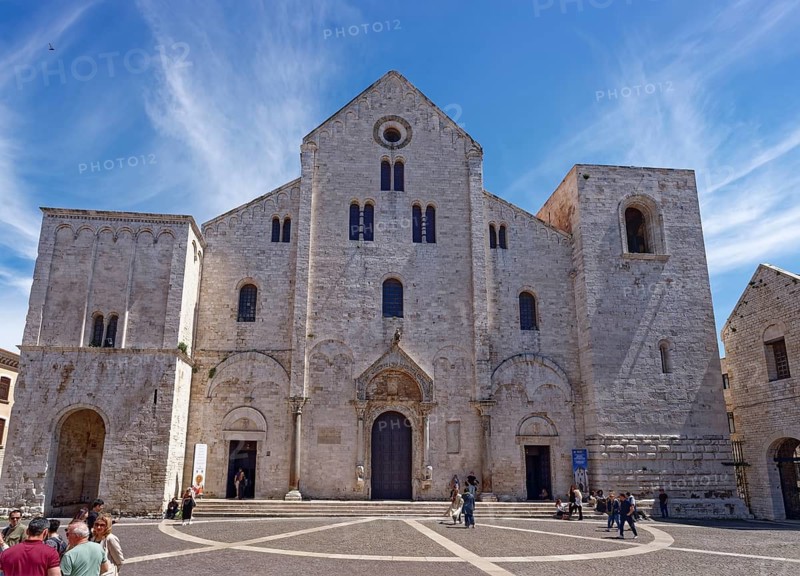 Basilica Pontificia San Nicola, Pontifical Basilica San Nicola, named after Nicholas of Myra, is a pilgrimage church for Roman Catholic and Orthodox Christians in Bari Veccia, the old town of the southern Italian city of Bari. The church is considered the founding building of the Barese Romanesque period. Bari, Apulia, Italy