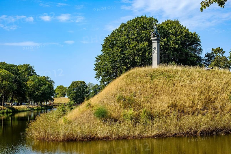 Karl XI monument on the wall of the southern bastion of the historic fortification of the Landskrona citadel, Skåne, Sweden. The Karl XI Monument on the Rampart of the Southern Bastion of the Historic Fortifications of Landskrona Citadel, Scania, Sweden