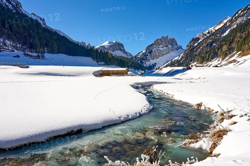 Snowy alpine winter landscape in the Alpstein, Säntis mountain range, Brülisau, Kanton Appenzell, Switzerland