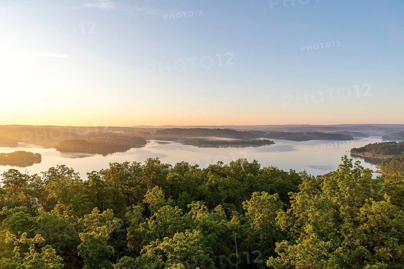 View from Julius-Mosen Tower of Pöhl Reservoir at sunrise with morning fog, Vogtland, Saxony, Germany