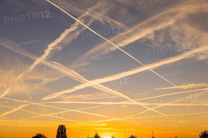 Contrails in the evening sky, Bannewitz, Saxony, Germany