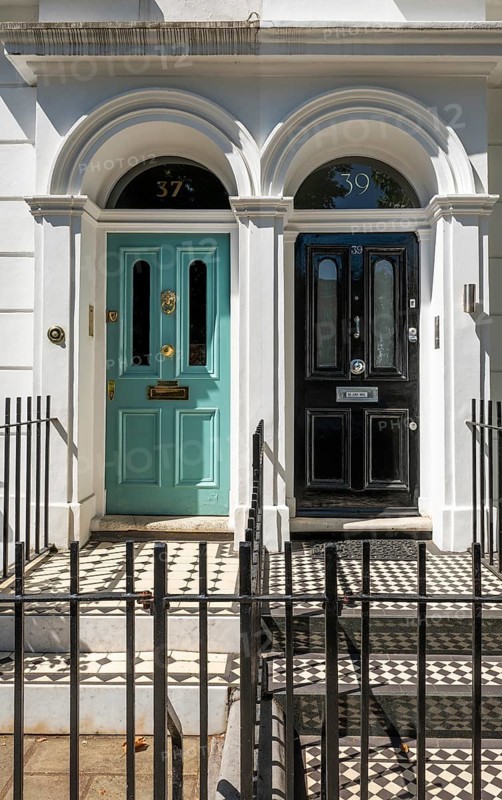 House entrances with turquoise and black entrance doors, mosaic tiles and wrought iron fence in front of them, Chelsea Embankment, London, Great Britain, England, Great Britain