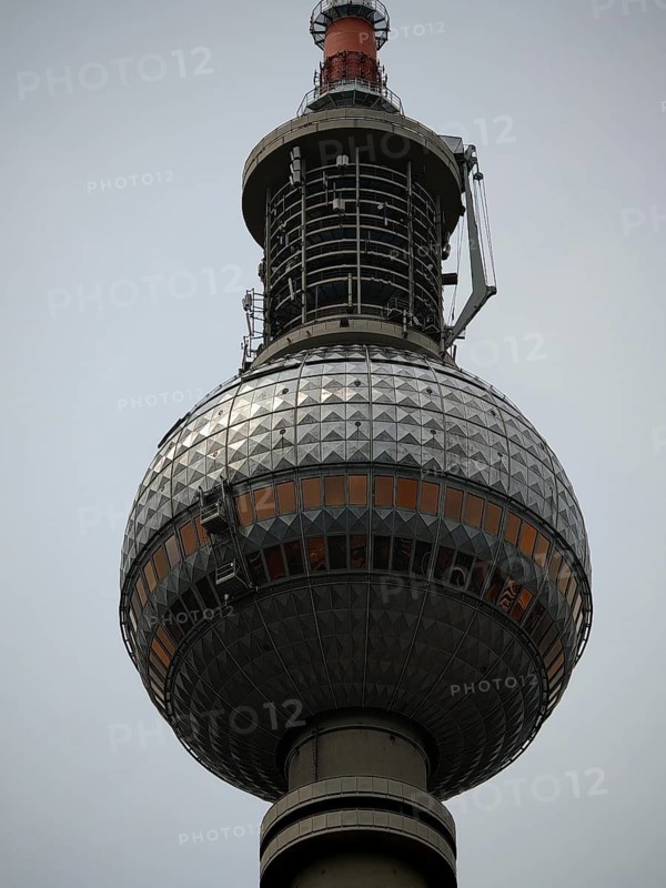 Close-up of Berlin TV Tower, modern design with metallic geometric patterns, Alexanderplatz, Berlin