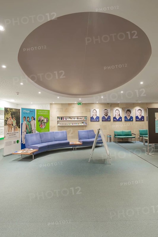 Modern hospital waiting area with blue seating, Nagold Hospital of the Southwest Clinic Network, Calw District, Germany