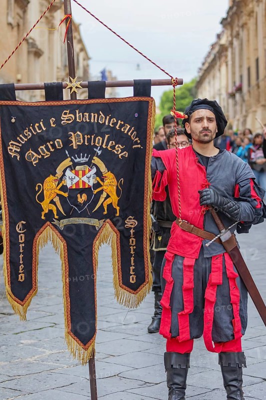 Participants wearing historical costumes on parade, Noto, Noto Valley, Sicily, Italy