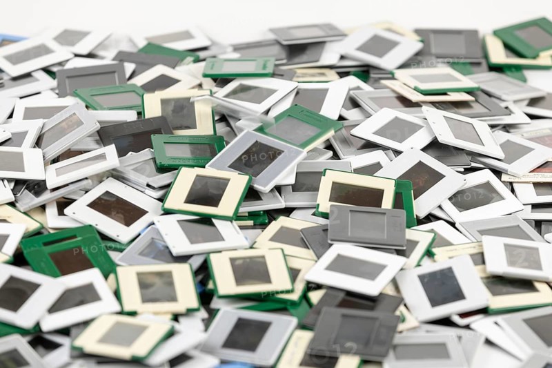 A disorderly pile of slides in different colors