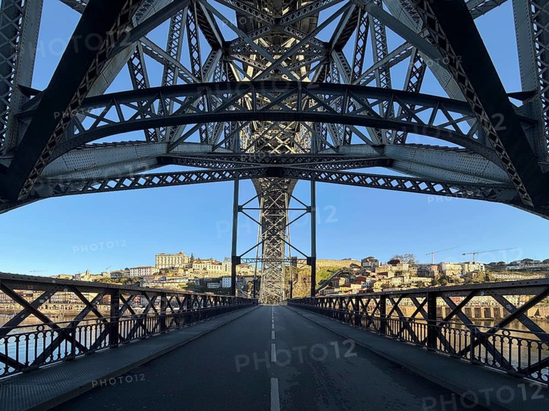 Ponte Dom Luis I arched bridge designed by Théophile Seyrig, viewed from the lower level towards Porto, Portugal