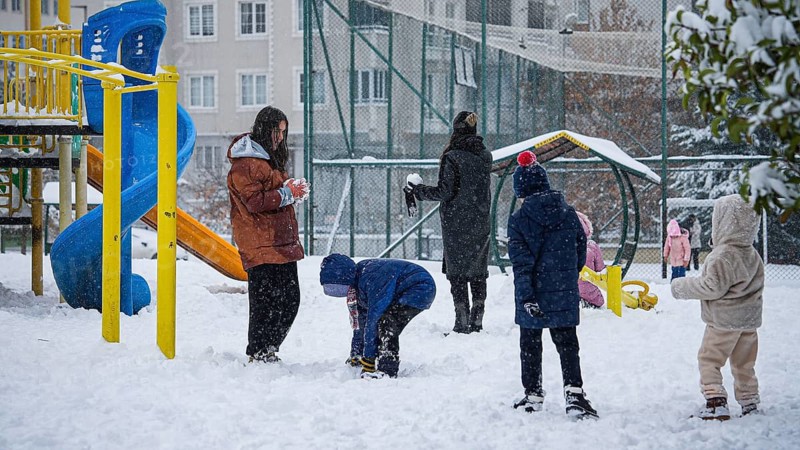 In Gaziantep, Turkey, on December 31, 2025, children and families enjoy winter activities as they play on snow-covered areas and slide on icy hills, creating a lively atmosphere across the city during the final day of the year, Gaziantep, Gaziantep, Turkey
