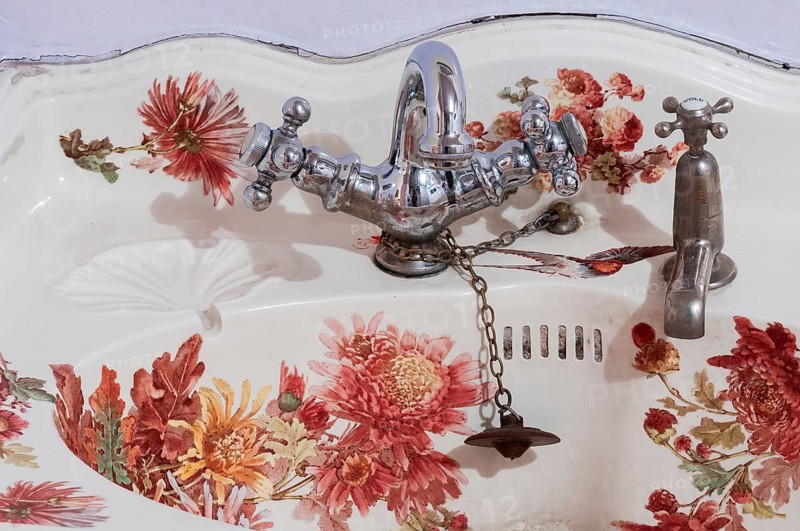 Old sink with silver faucet and floral motifs on sink, Shimla, Himachal Pradesh, North India, India