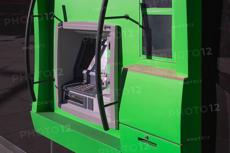 ATM banking machine in financial city business center ready for electronic money withdrawal