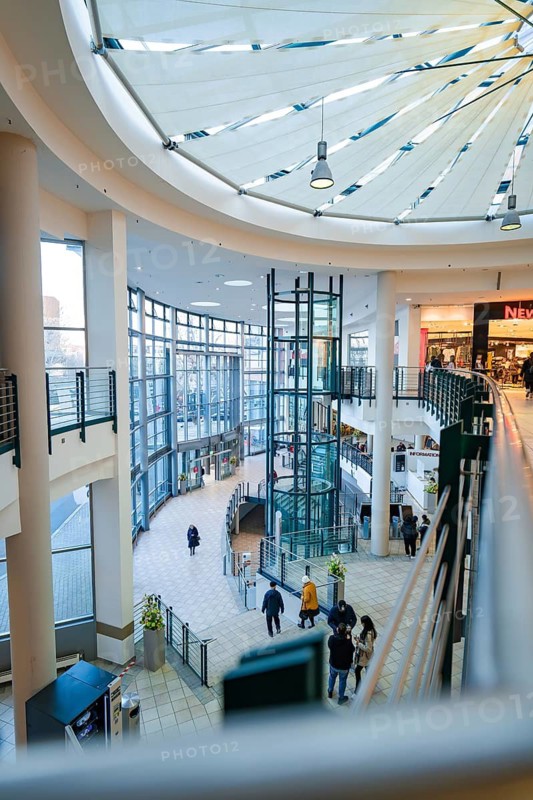 Open, multi-storey shopping centre with modern glass roof and bright premises, Sterncenter Sindelfingen, Böblingen district, Germany