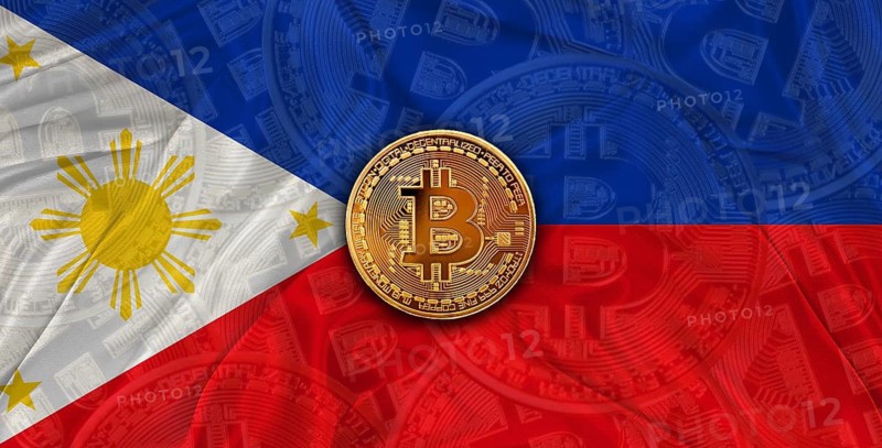 Investors in Blockchain Technology with Philippines flag background. Bitcoin cryptocurrency with Philippine flag