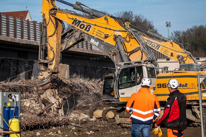 Demolition of the 120 meter long motorway bridge of the A516, across Teutoburger Straße in Oberhausen-Sterkrade, the bridge, built in 1970 was severely damaged, traffic continues to roll on the still existing West Bridge, after the demolition, the eastern part is rebuilt using a process unique in the world, 40 meter long precast concrete beams are assembled one after the other, reducing the construction period from 24 to 7 months after the completion of this bridge Will the western part also be rebuilt, North Rhine-Westphalia, Germany