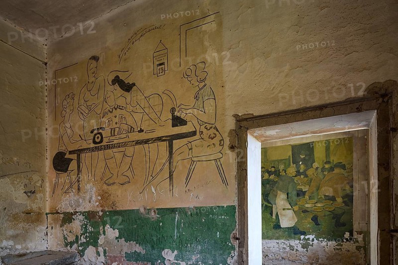 Sketchy wall drawing in an abandoned room, showing people at a table with typewriter, Lost Place, Tourtouras Mountain, WW2, World War II, German coastal battery PL 388, marine artillerymen, Diapori, Xirokambos, Leros, Dodecanese, Greek Islands, Greece