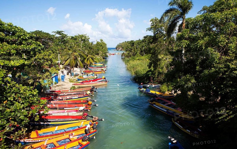 Colourful fishing boats on the banks of the White River or river at Ochos Rios, Saint Ann Parish and Saint May Parish, West Indies, Caribbean, Central America