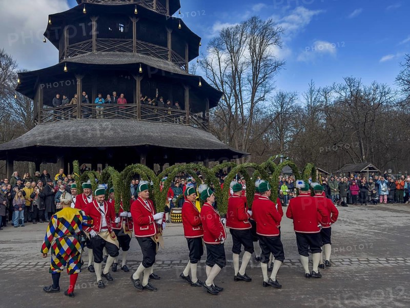 Schaeffler dance in 2026 in the English Garden, behind the Chinese Tower. The event takes place every 7 years between Epiphany and Shrove Tuesday, Munich, Bavaria, Germany