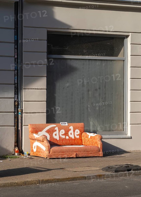 Garbage parked on public roads, couch in orange, Neue Schönholzer Straße, Berlin, Germany