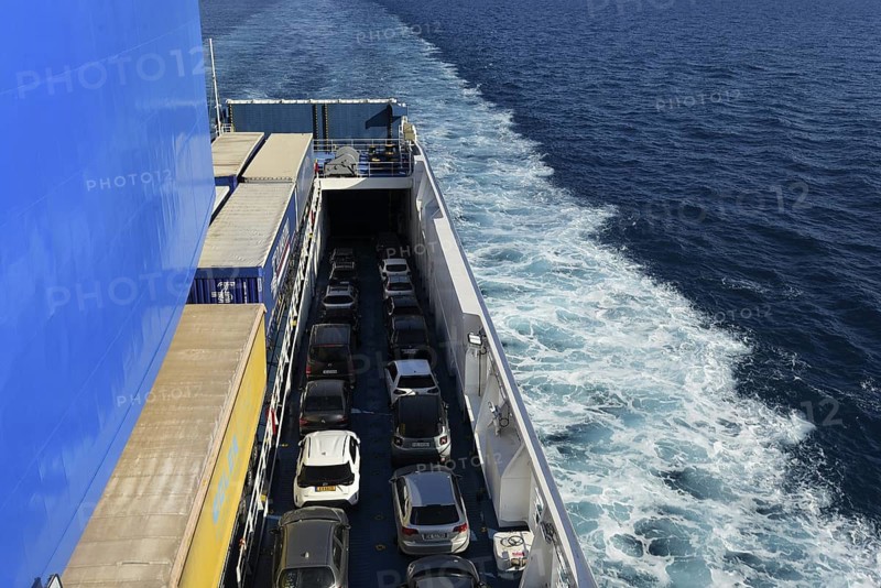 A car ferry of the GNV shipping company on its way from Palermo / Sicily shortly in front of entering the harbour of Genoa. Lorry trailers and cars can be seen on board
