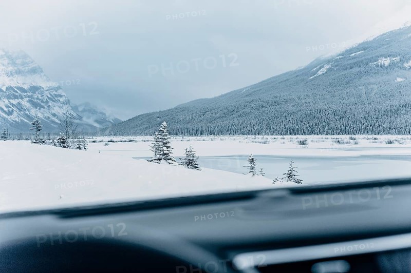 Winter road trip on the Icefields Parkway with lots of snow and ice, Banff National Park, Jasper National Park, Alberta, Canada