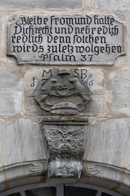 Slogan and relief of a baker's sign from 1766, above an entrance door, Obere Wehd 2, Altdorf, Middle Franconia, Bavaria, Germany
