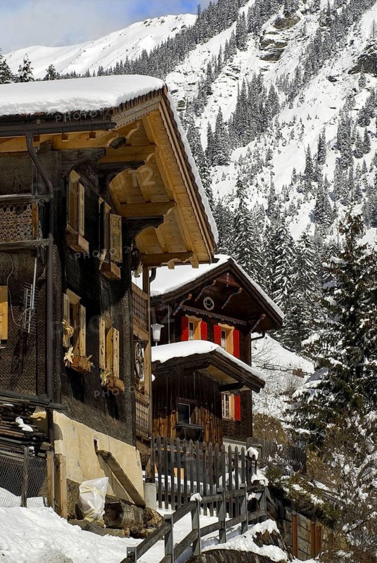 Typical farm houses in Langwies in Switzerland. winter, wooden house, wooden houses, farmhouse, farmhouses