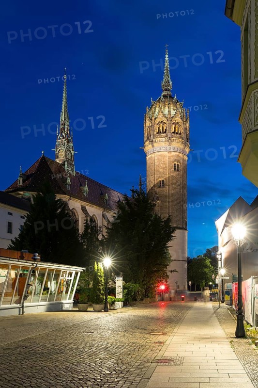 Atmospheric night view, Schlossplatz with castle church and castle church tower, Luther city Wittenberg, Saxony-Anhalt, Germany